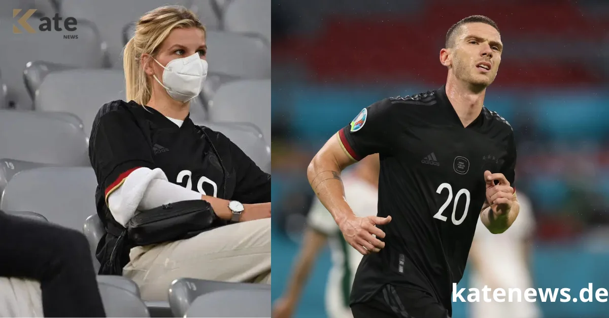Action-Shot von robin auf dem Spielfeld, rabea am Spielfeldrand jubelnd — Caption: „Support am Spielfeldrand: rabea und nationalspieler robin gosens zeigen Verbundenheit.